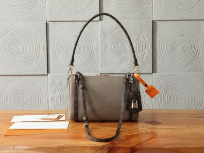 Louis Vuitton Express PM handbag